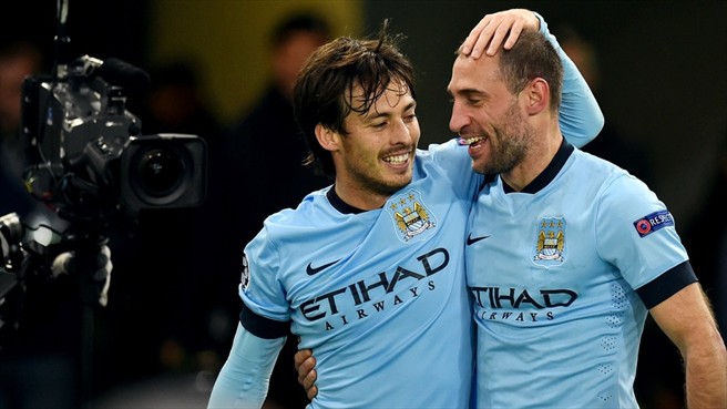 David Silva congratulates teammate Pablo Zabaleta after the latter scored City's second on the night