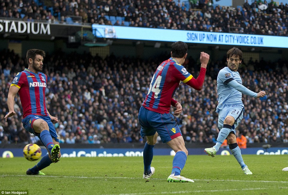 David Silva scores his second goal of the game after slotting the ball past a couple of Palace defenders