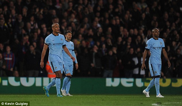 Vincent Kompany, Fernandinho and Martin Demichelis cut dejected figures as they slumped to a defeat against Crystal Palcae